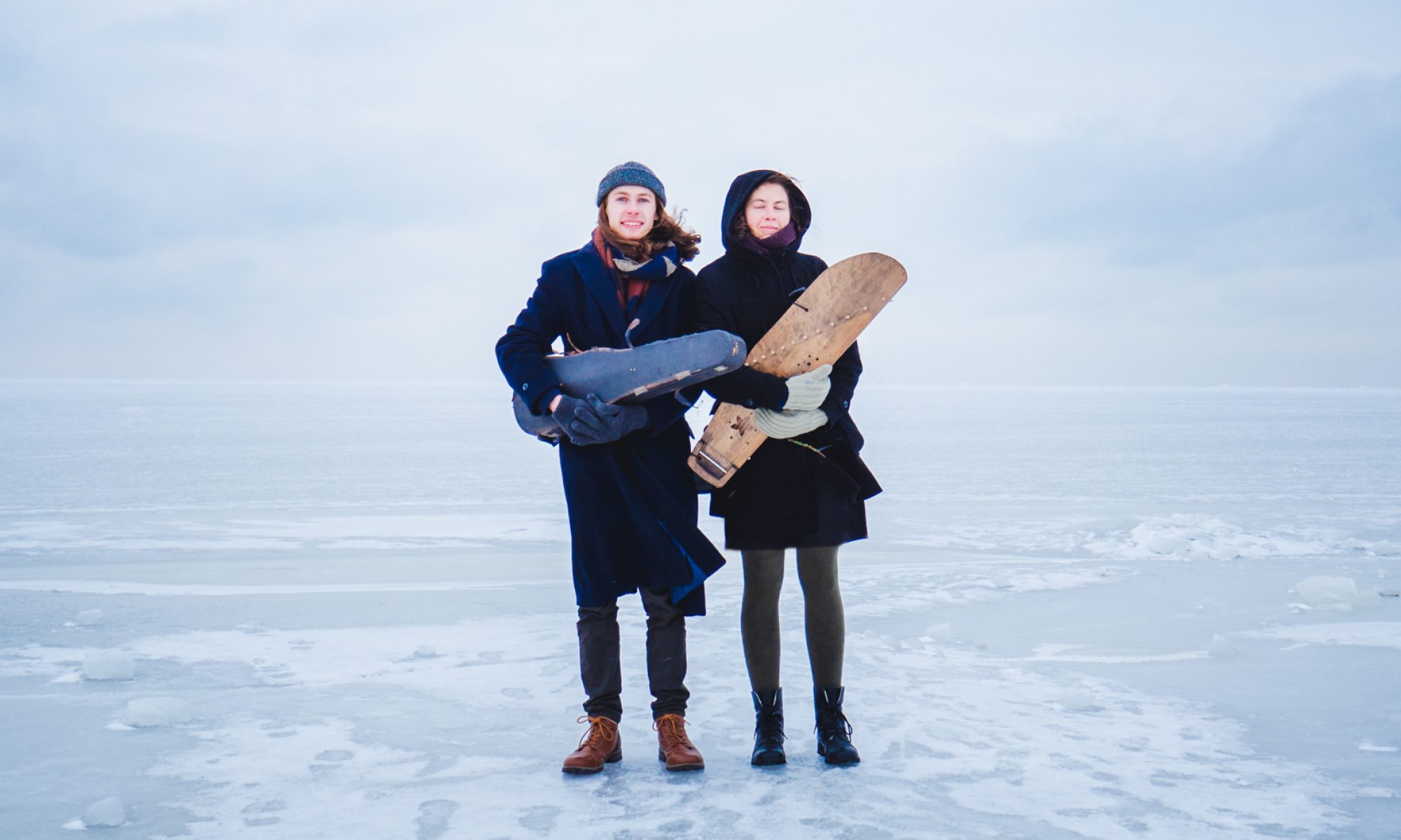 Eva Väljaots & Robbie Sherratt standing on the Baltic Sea